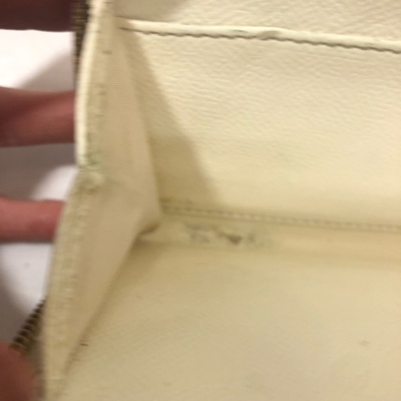 Coach debossed creamy white double zipper wristlet